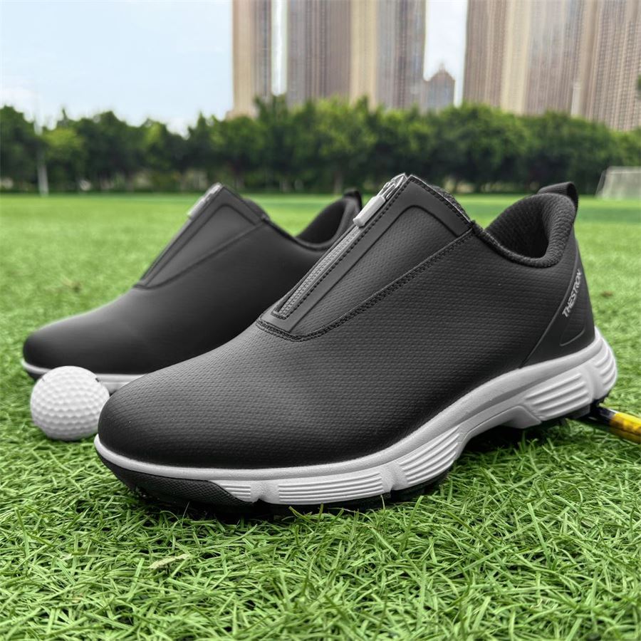 Women's Zip Slip-On Spiked Golf Shoe on the golf course, view 1