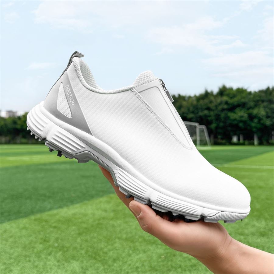 Women's Zip Slip-On Spiked Golf Shoe on the golf course, view 5