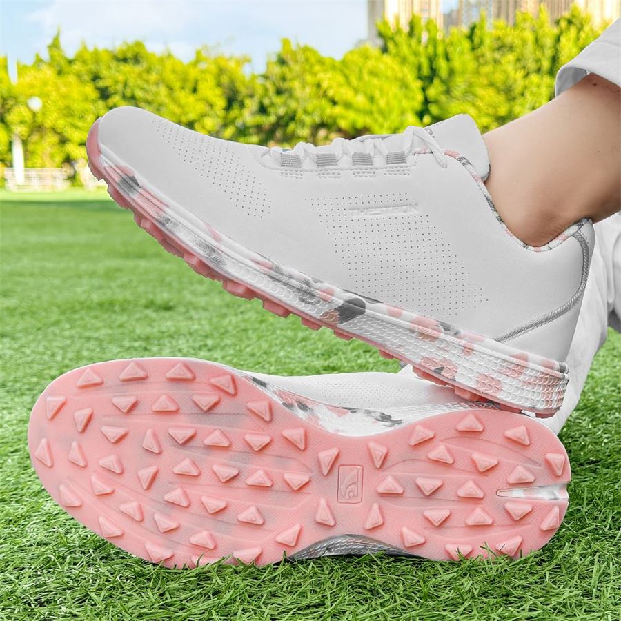 Women's Athletic Spikeless Golf Shoe on the golf course, view 3
