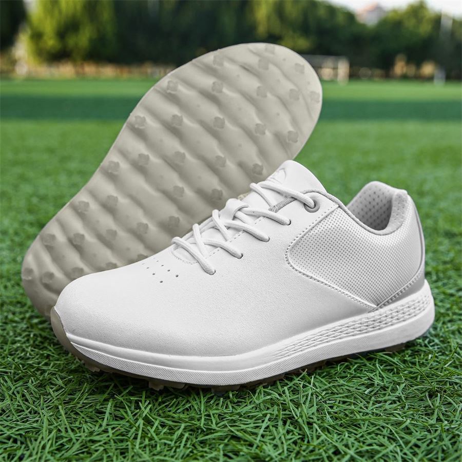 Women's Gradient Spikeless Golf Shoe on the golf course, view 2