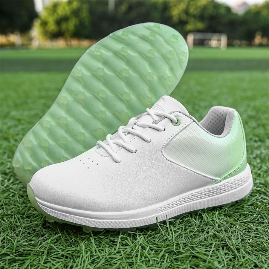 Women's Gradient Spikeless Golf Shoe on the golf course, view 4