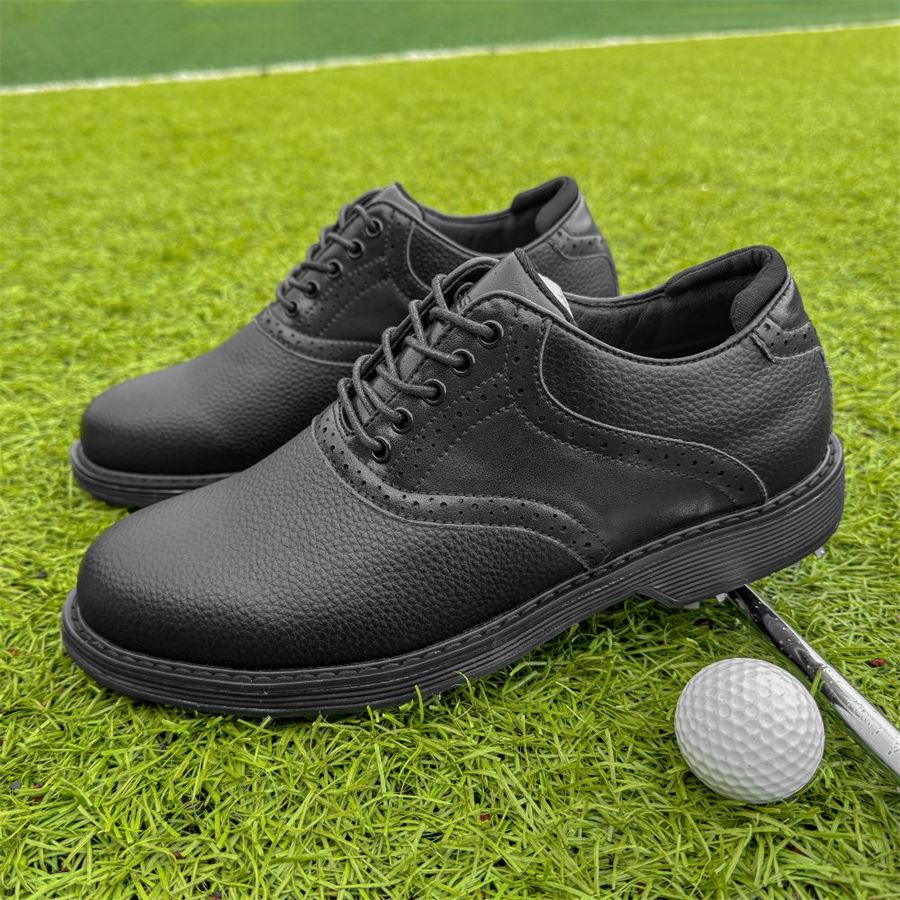 Classic Saddle Oxford Spiked Golf Shoe on the golf course, view 1
