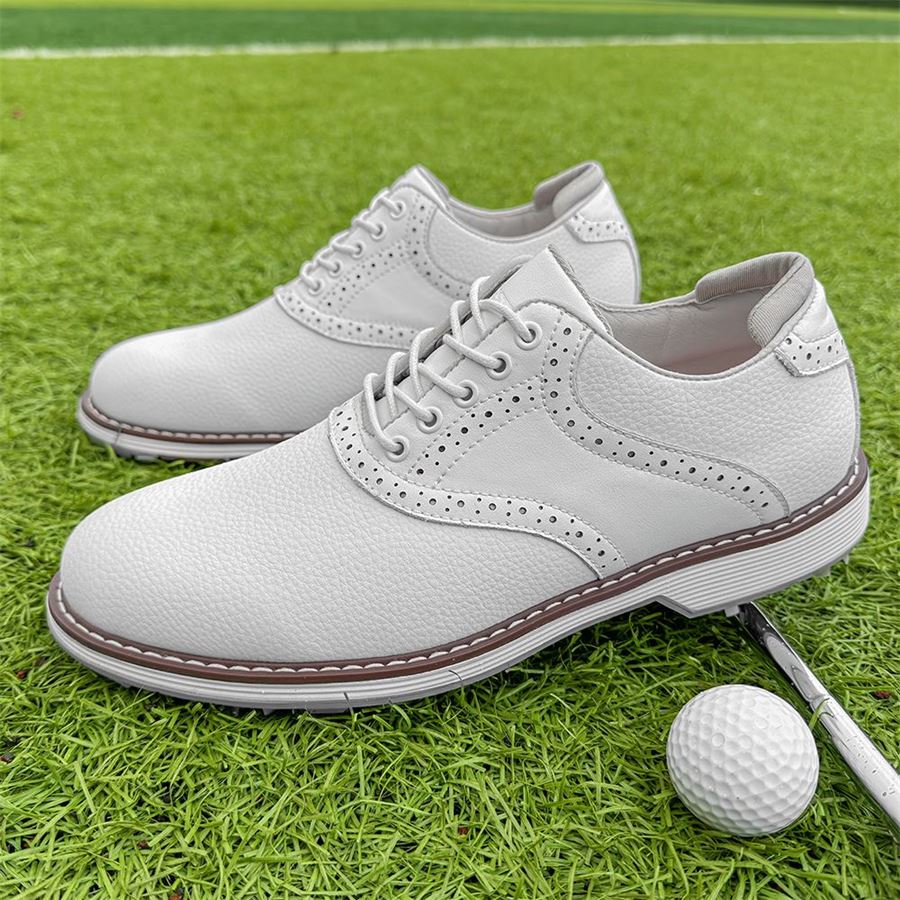 Classic Saddle Oxford Spiked Golf Shoe on the golf course, view 2