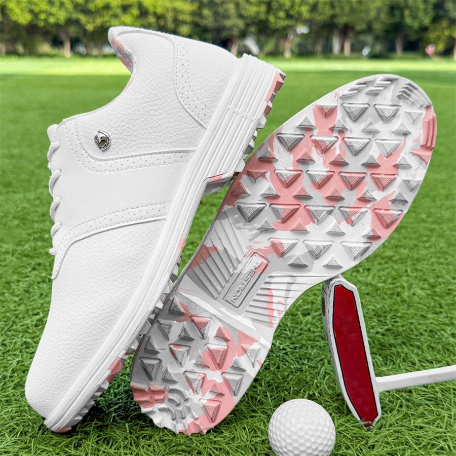 Women's Saddle Spikeless Golf Shoe on the golf course, view 1
