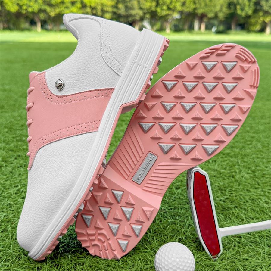 Women's Saddle Spikeless Golf Shoe on the golf course, view 2