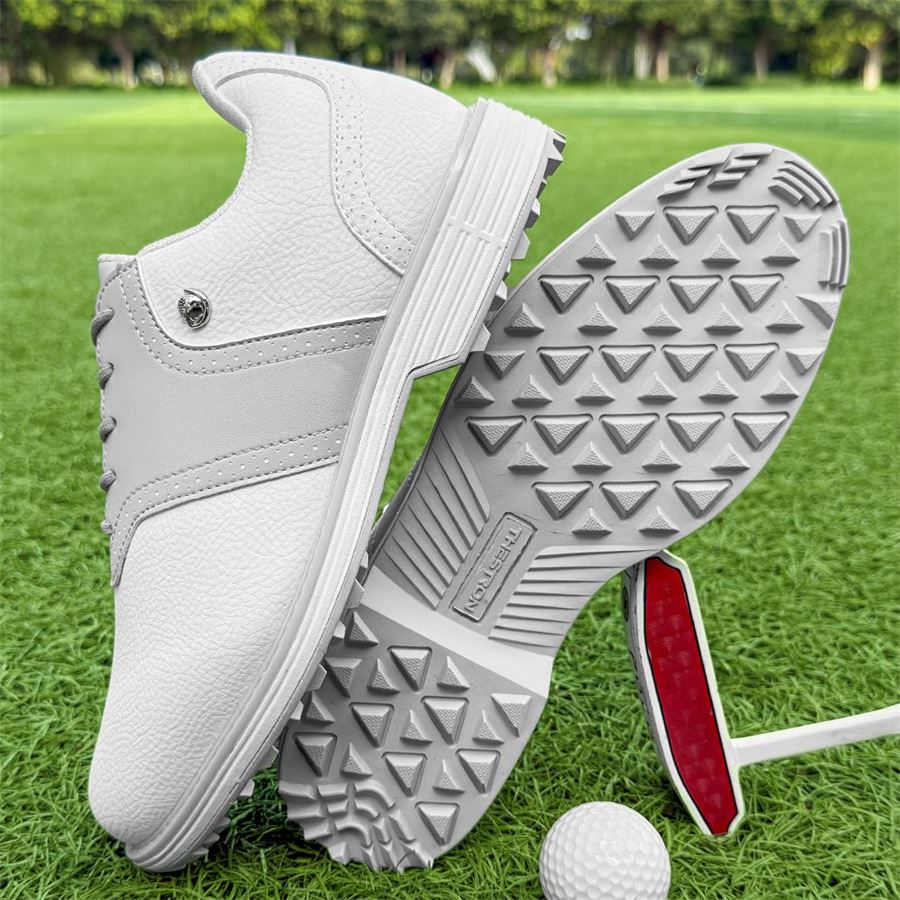 Women's Saddle Spikeless Golf Shoe on the golf course, view 3