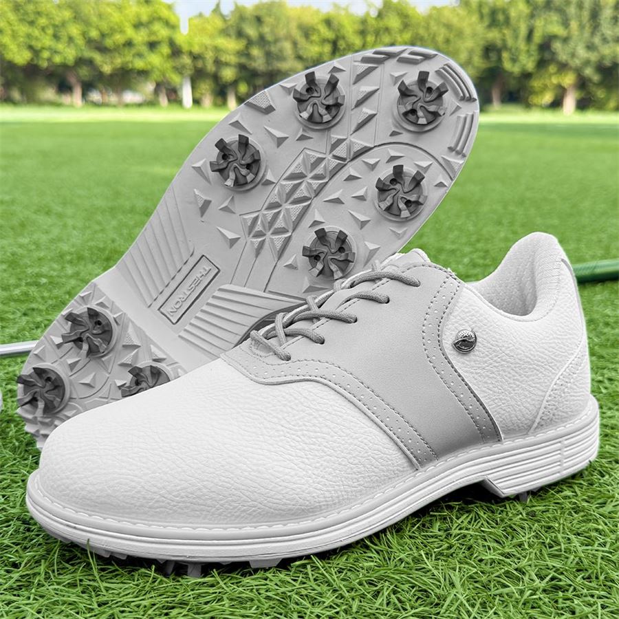 Women's Heritage Saddle Spiked Golf Shoe on the golf course, view 3
