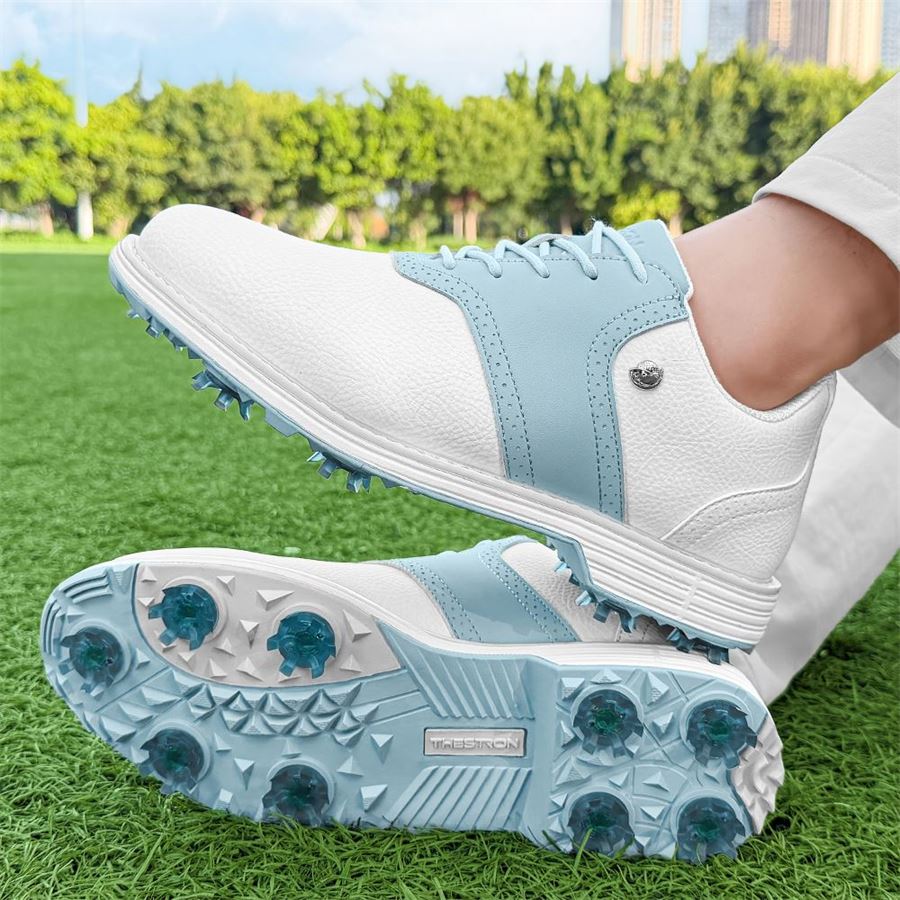 Women's Heritage Saddle Spiked Golf Shoe on the golf course, view 5