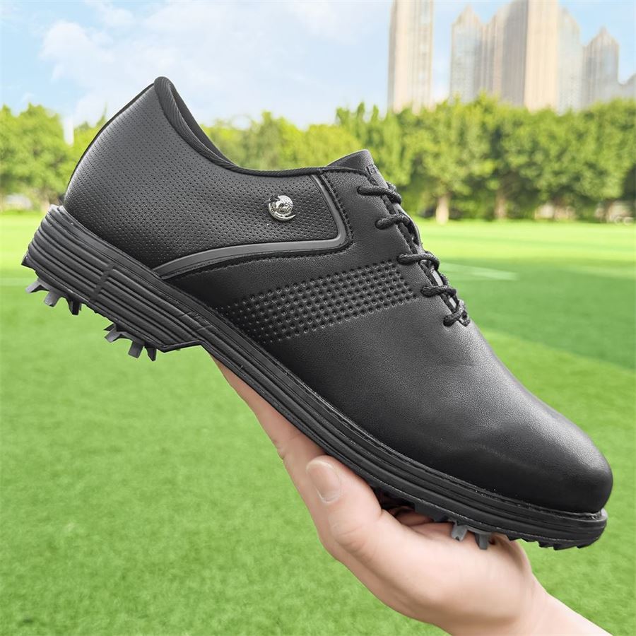Tour Classic Spiked Golf Shoe on the golf course, view 1