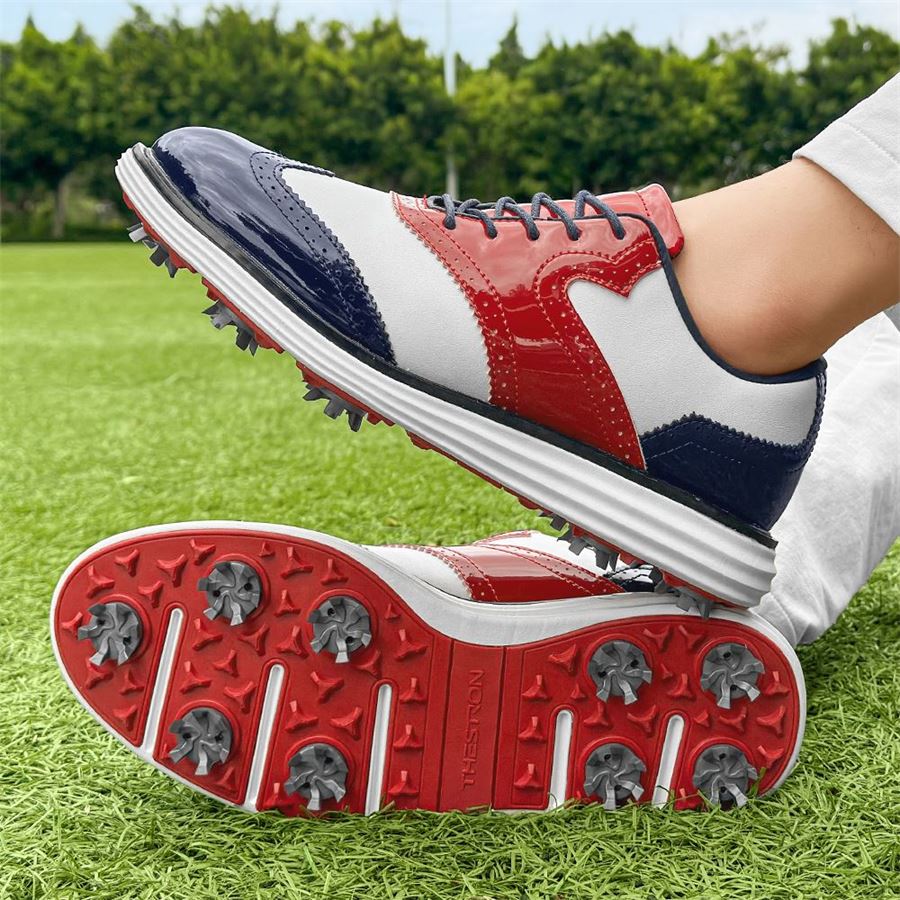 Wingtip Glossy Spiked Golf Shoe on the golf course, view 1