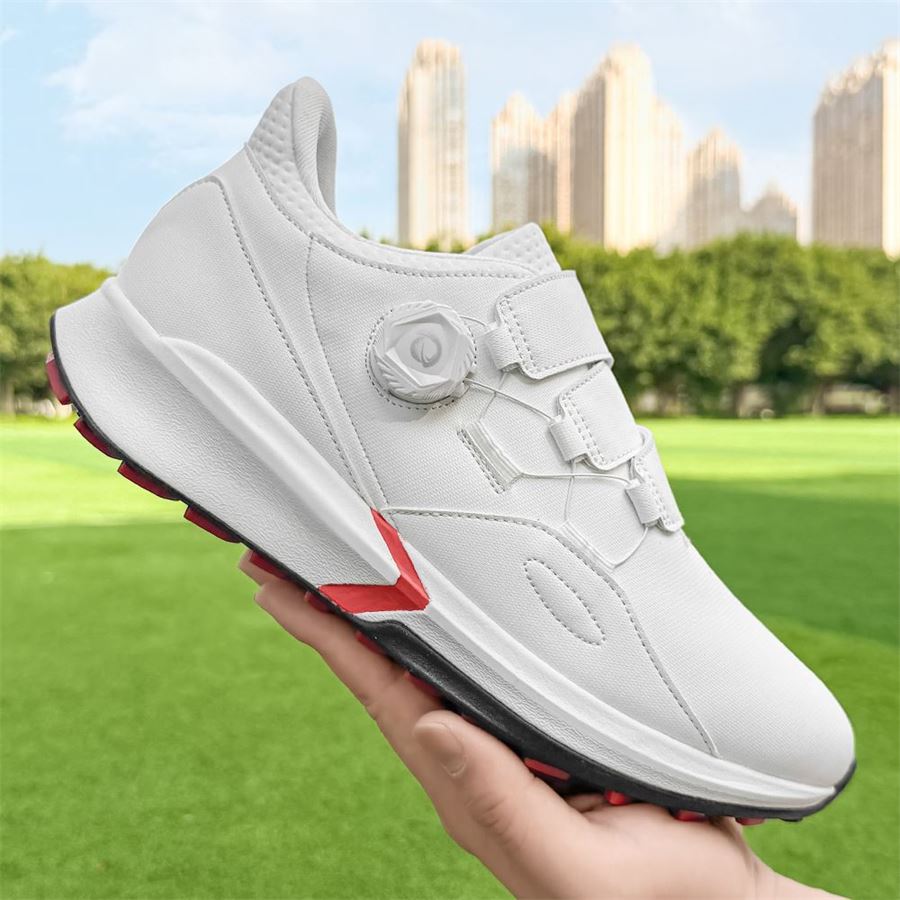 Rotary-Lace Strap Spikeless Golf Shoe on the golf course, view 1