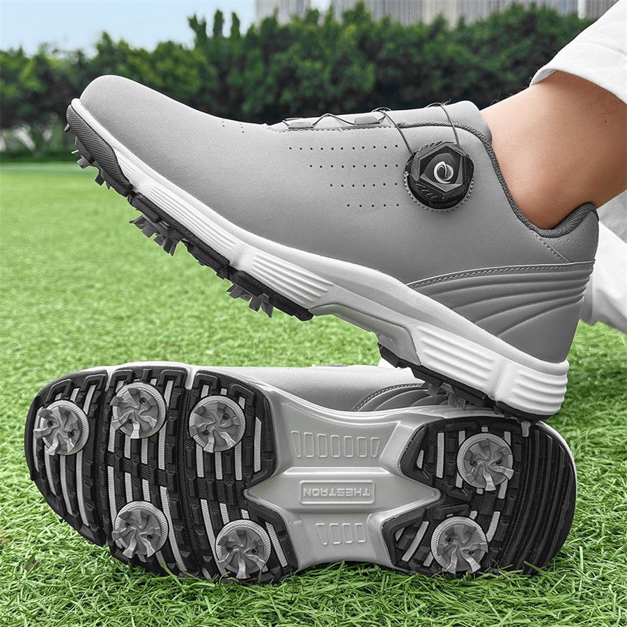 Performance Rotary-Lace Spiked Golf Shoe on the golf course, view 1